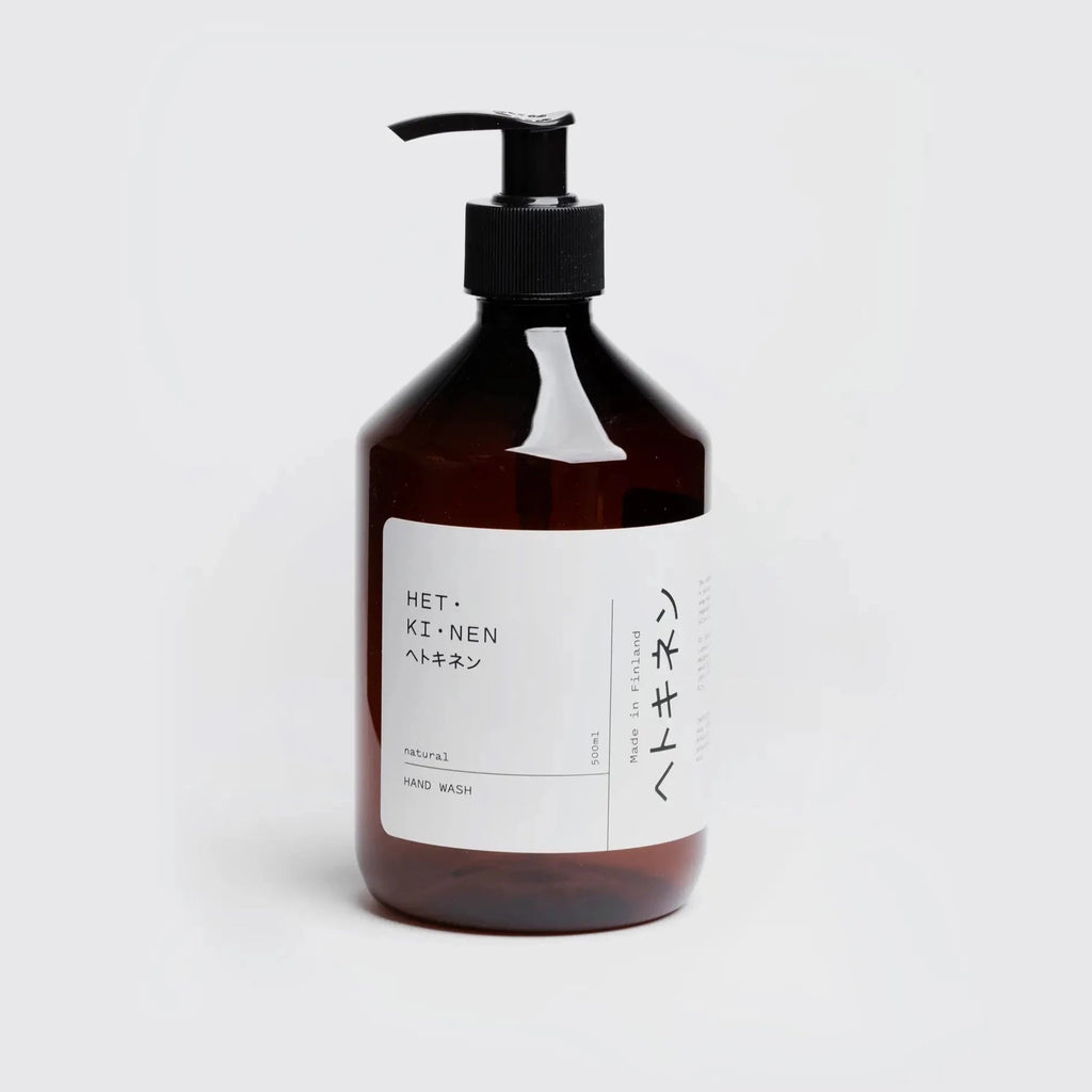 A bottle of Hetkinen Natural Hand Soap with Japanese writing and Gestalt Haus branding.