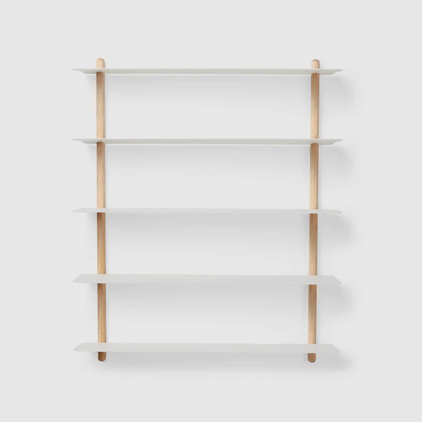 A NIVO SHELF E with wooden shelves against a white wall, made by GEJST in collaboration with Gestalt Haus.