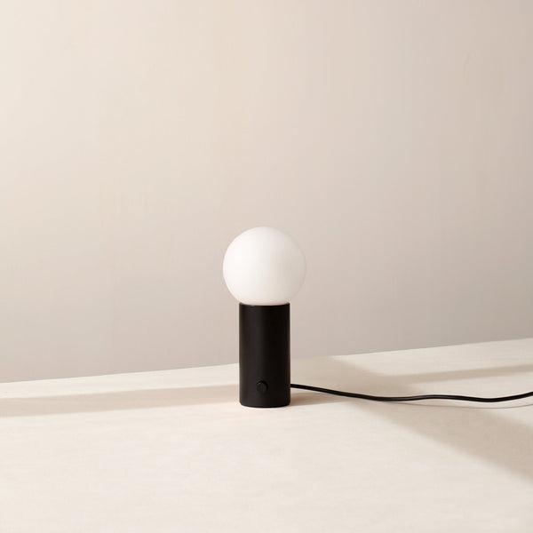 A white ball ORB TABLE LAMP at Gestalt Haus.