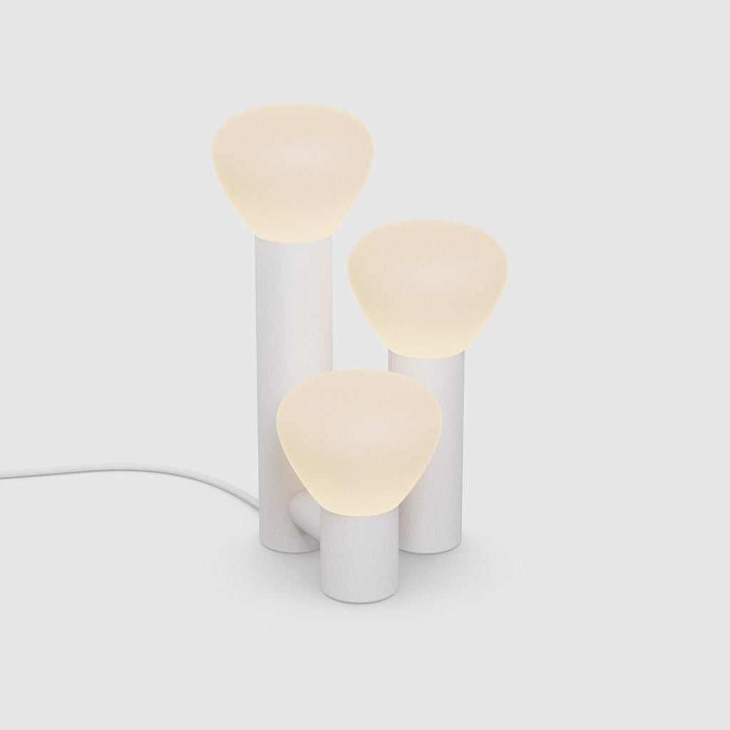 A PARC 06 TABLE LAMP by LAMBERT ET FILS with three lights on it, available at Gestalt Haus.