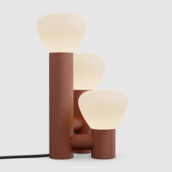 A PARC 06 TABLE LAMP by LAMBERT ET FILS with three lights on it, designed in a Gestalt Haus style.