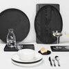 A set of Gestalt Haus cutting boards and utensils by Vincent Van Duysen.