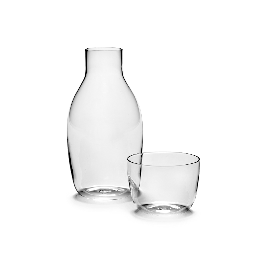 A Gestalt Haus glass jug and a SERAX glass cup are displayed together.