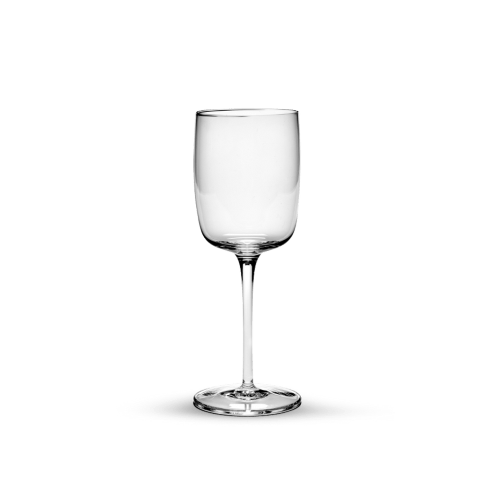 A Gestalt Haus wine glass on a black background by SERAX.