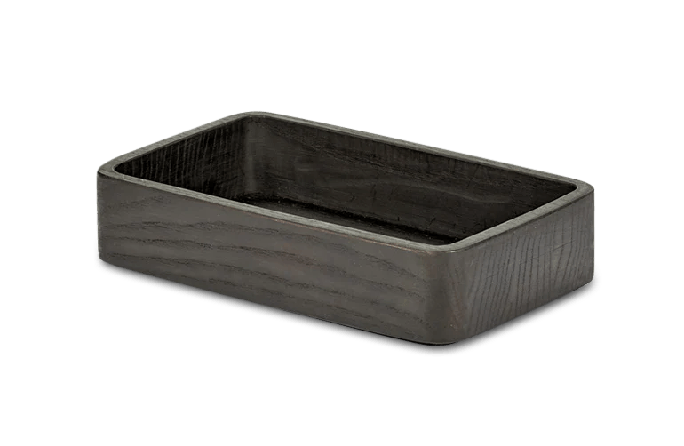 A black wooden Gestalt Haus tray by Vincent Van Duysen on a white background.