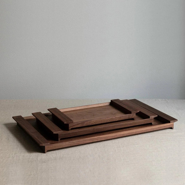 A Gestalt Haus PONTE TRAYS tray sitting on top of a table.