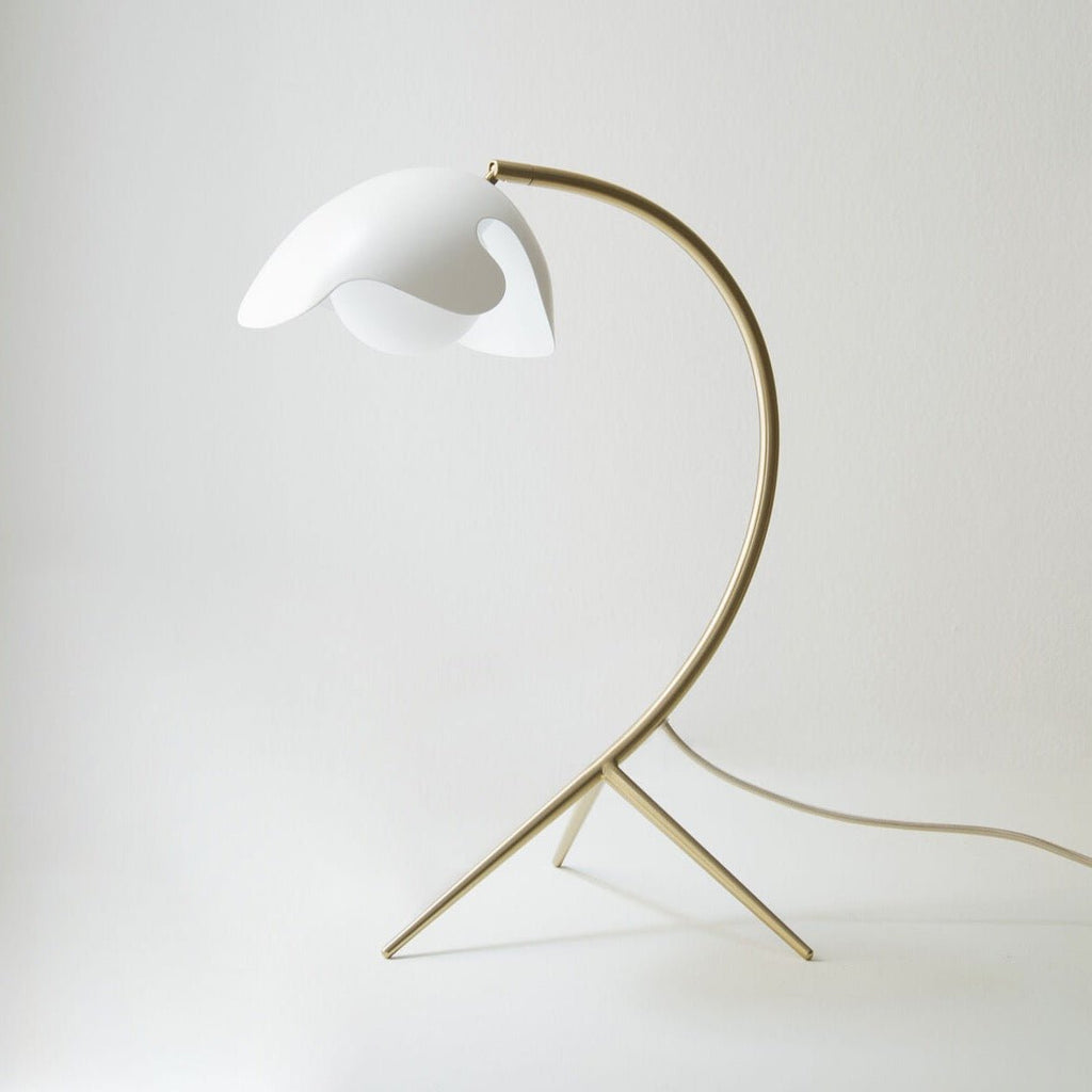 An ATBO PS38 TABLE LAMP adorned with a white flower in the style of Gestalt Haus.