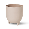 A small FLOWERPOT by KRISTINA DAM STUDIO on a white background, exuding SERENITY.