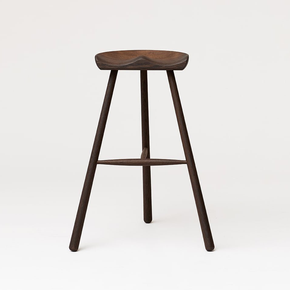 A SHOEMAKER CHAIR™ No. 78 by FORM & REFINE featuring a wooden seat in Gestalt Haus aesthetic.