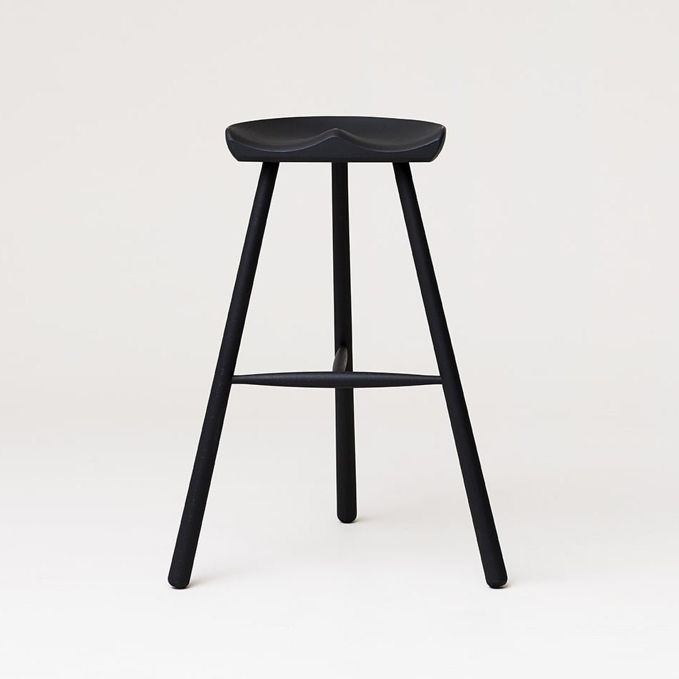 A SHOEMAKER CHAIR™ No. 78 by FORM & REFINE, black stool inspired by Gestalt Haus design, set against a white background.