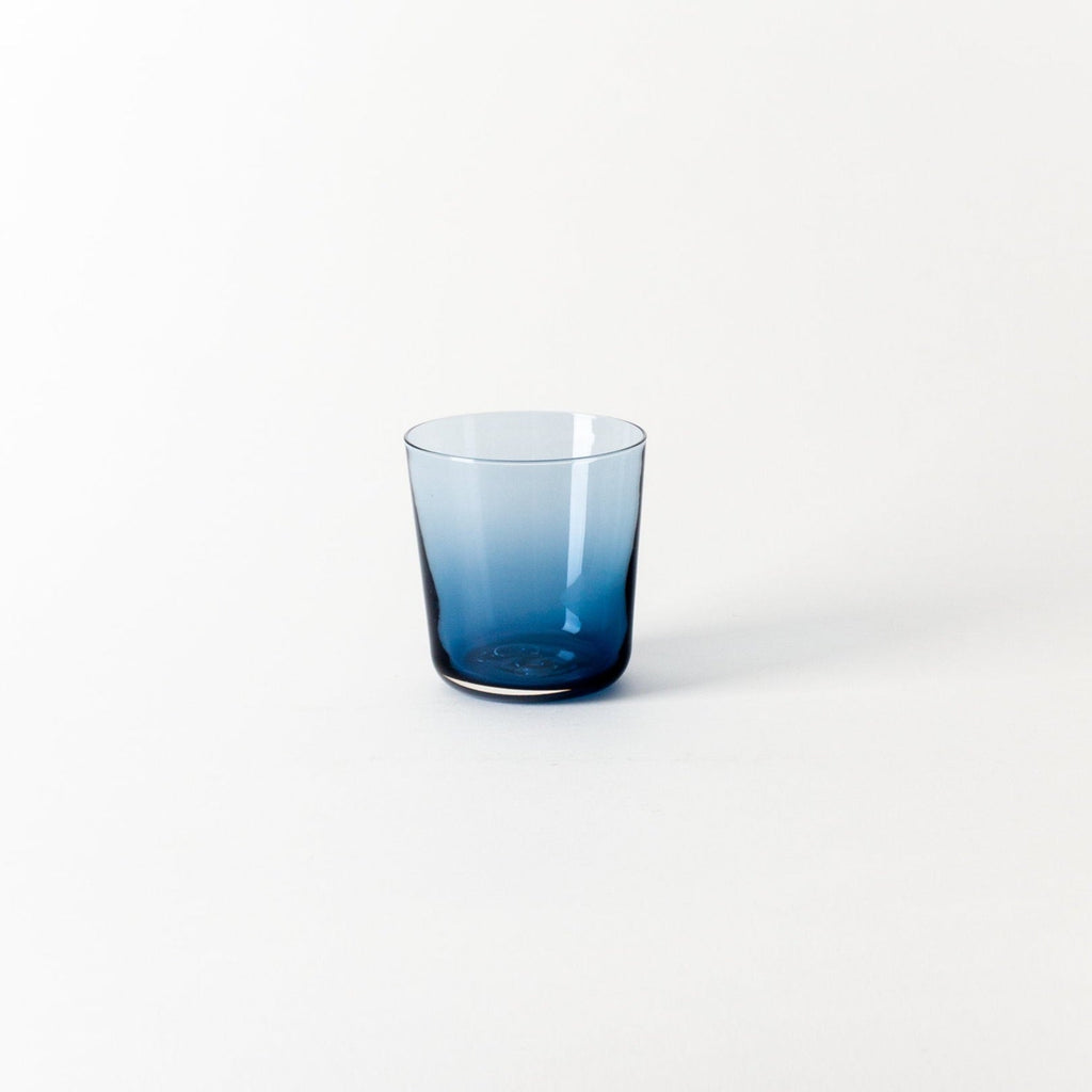 A SHORT GLASS from GARY BODKER DESIGNS sitting on a white surface at Gestalt Haus.