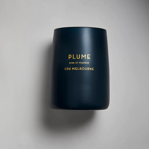 A SOH MELBOURNE PLUME CANDLE.