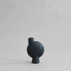 A SPHERE VASE BUBL - MEDIO from 101 COPENHAGEN on a grey background, inspired by Gestalt Haus.