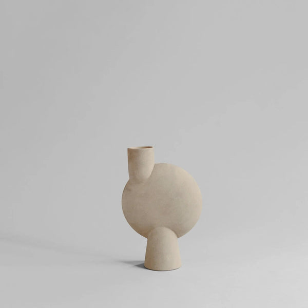 A SPHERE VASE BUBL - MEDIO by 101 COPENHAGEN, featuring a grey background.