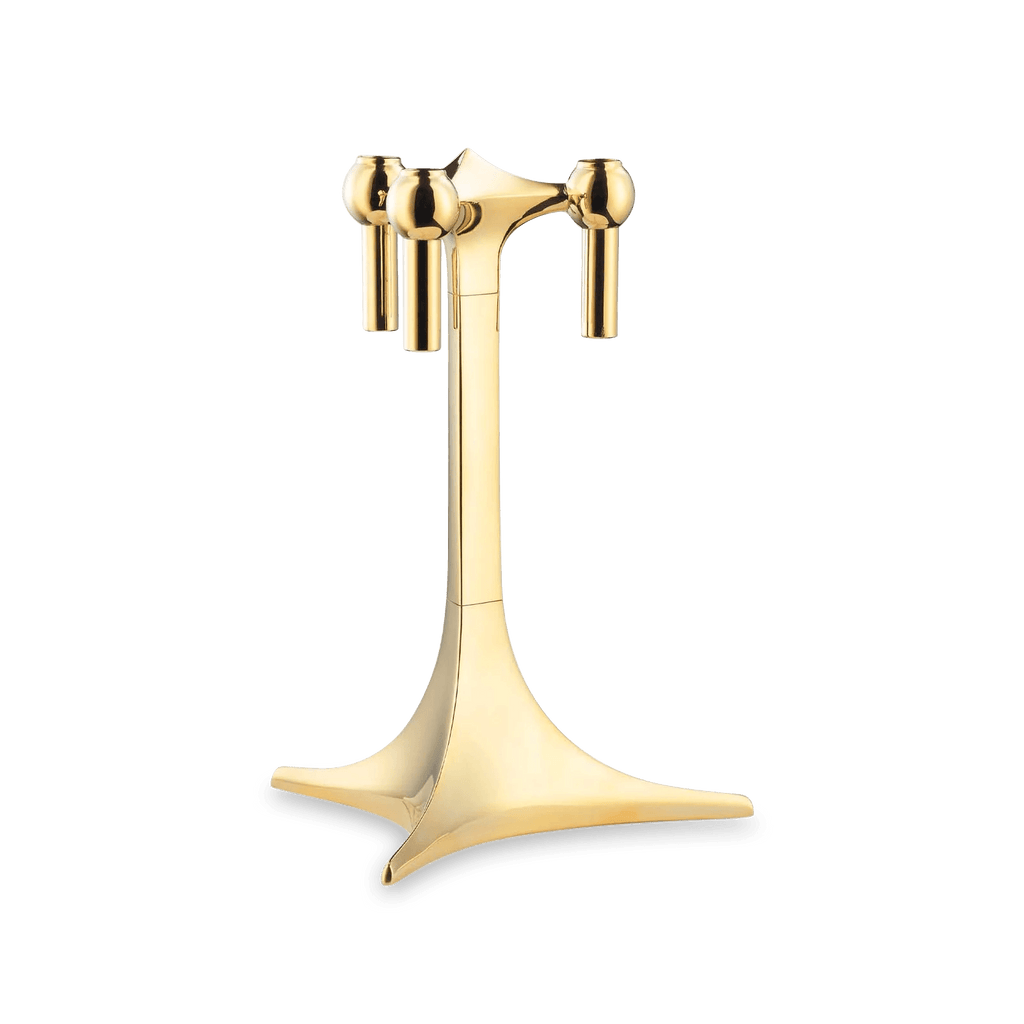 A gold plated toilet paper holder by STOFF NAGEL featuring Gestalt Haus design, showcased against a white background.