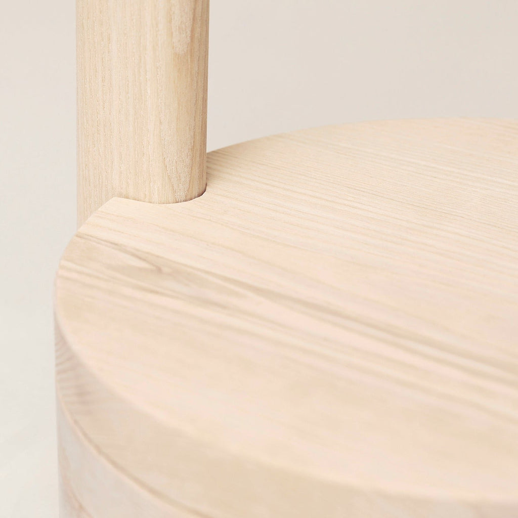 A close up of a FORM & REFINE STILK SIDE TABLE on a white surface at Gestalt Haus.
