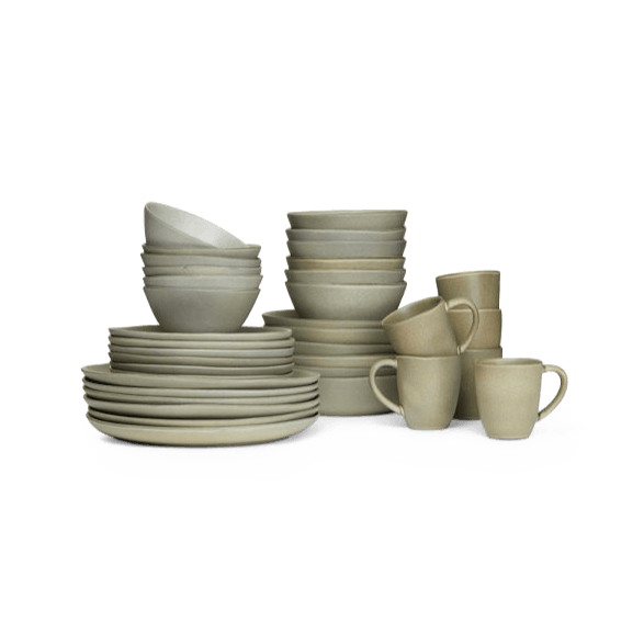 A set of KLASSIK STUDIO dishes and cups on a Gestalt Haus background.