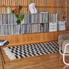 The Sera Helsinki Gestalt Haus Rug in a living room.