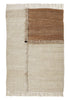 A beige and brown E-1027 rug by Sera Helsinki with fringes in the style of Gestalt Haus.