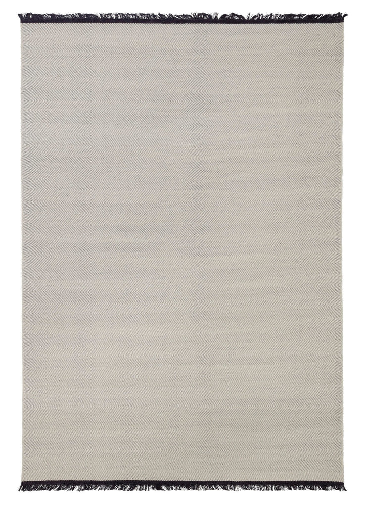 A THE FELICIA RUG by FABULA LIVING with fringes on a white background inspired by Gestalt Haus.