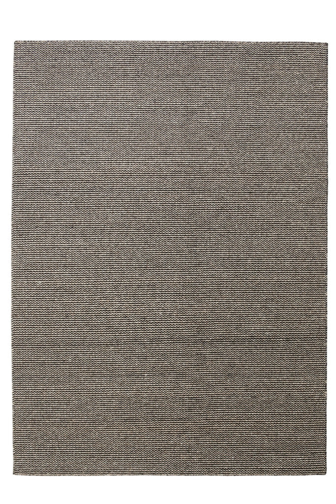 A FABULA LIVING rug on a white background.