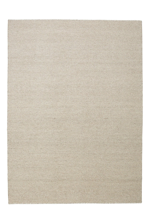 A THE FENRIS RUG by FABULA LIVING on a white background with Gestalt Haus influences.