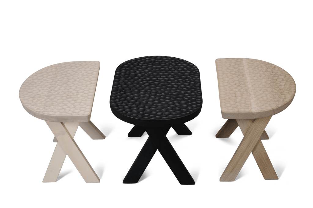 Three THE TOUCH STOOLS by ZANAT with a black and white design, inspired by Gestalt Haus.