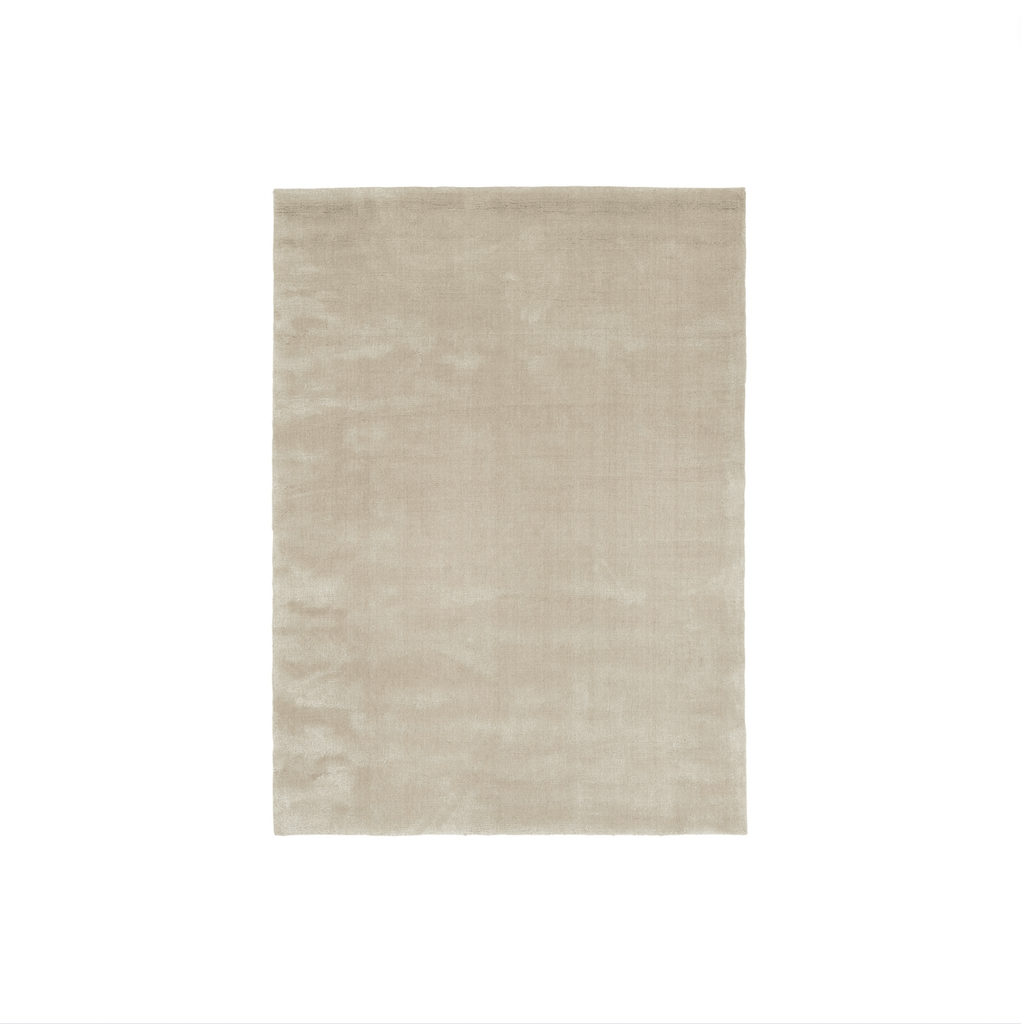 A beige Vidar rug by Fabula Living on a white background in a Gestalt Haus style.