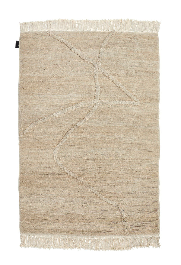 A Vuoristo rug with fringes on a white background by Sera Helsinki, embodying the essence of Gestalt Haus design.