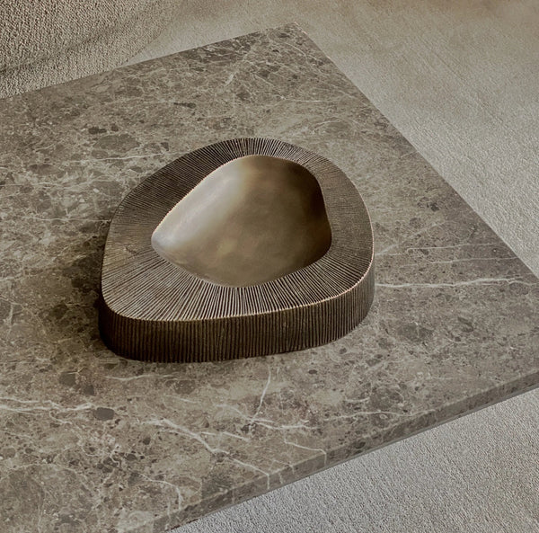 A VALLEY BOWL showcased on a marble table at Gestalt Haus.