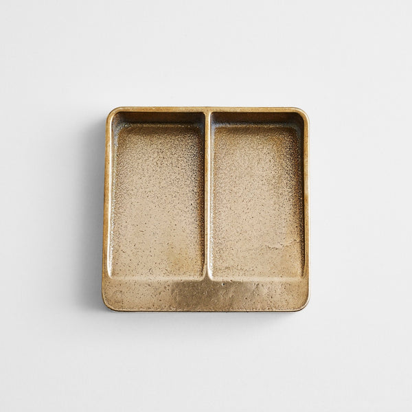 A VIDE POCHE by STUDIO HENRY WILSON with two compartments on a white Gestalt surface.